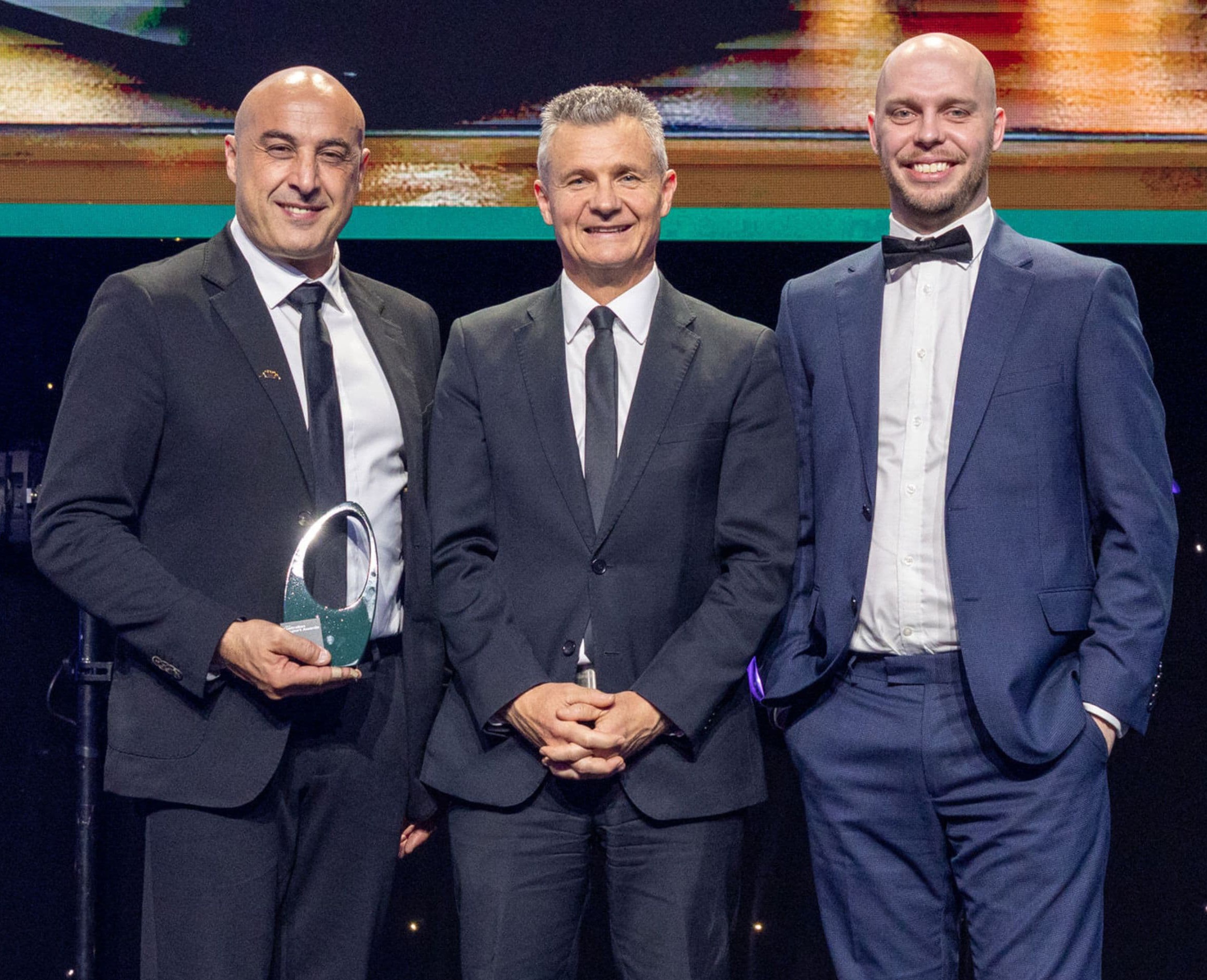 David Ialeggio CTO left and Scott Babolka Marketing Manager right accepting the Export Award for Technology