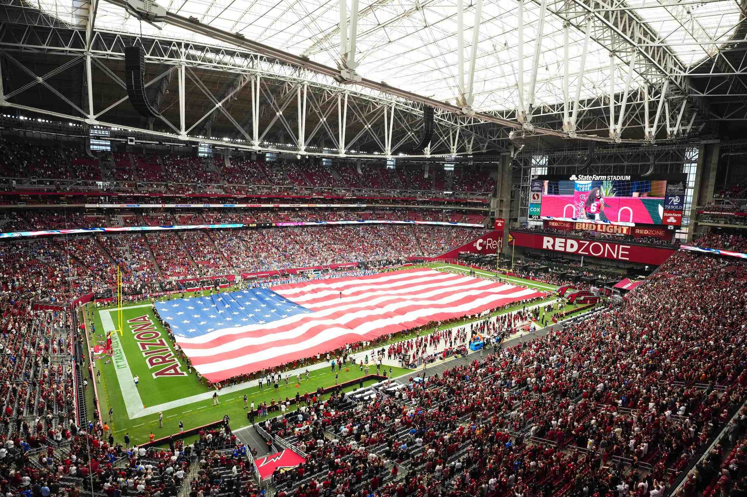 USA flag on the field at State Farm Stadium