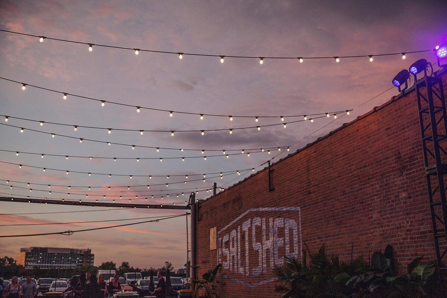 Brick wall with the Salt Shed logo